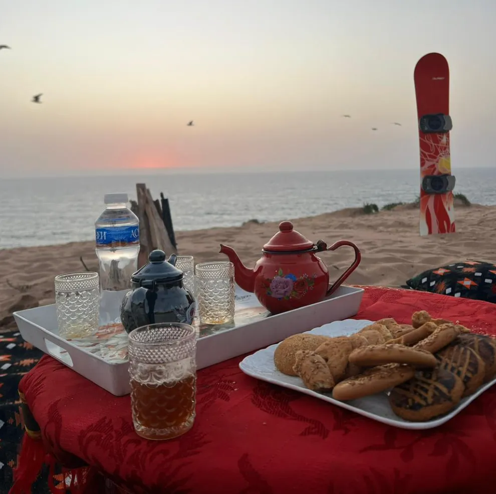 Sandboarding in Timlalin canyon (Timlaline canyons) dunes near Agadir
