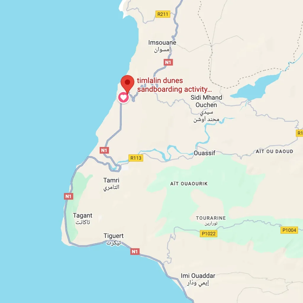 Sandboarding in Timlalin canyon (Timlaline canyons) dunes near Agadir