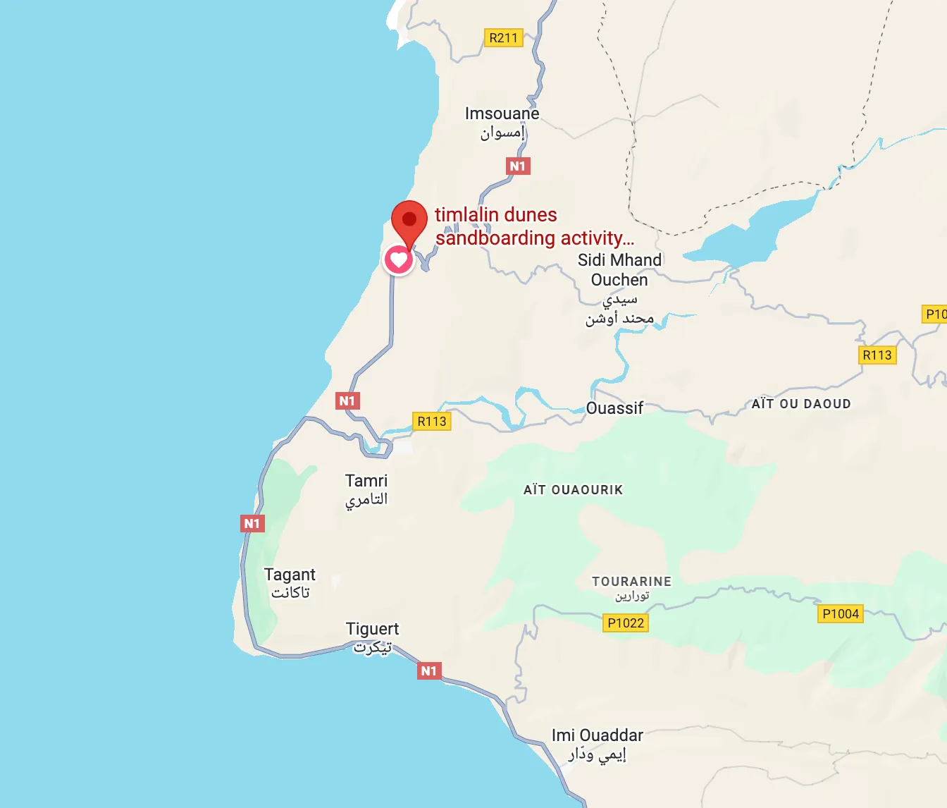 Sandboarding in Timlalin canyon (Timlaline canyons) dunes near Agadir