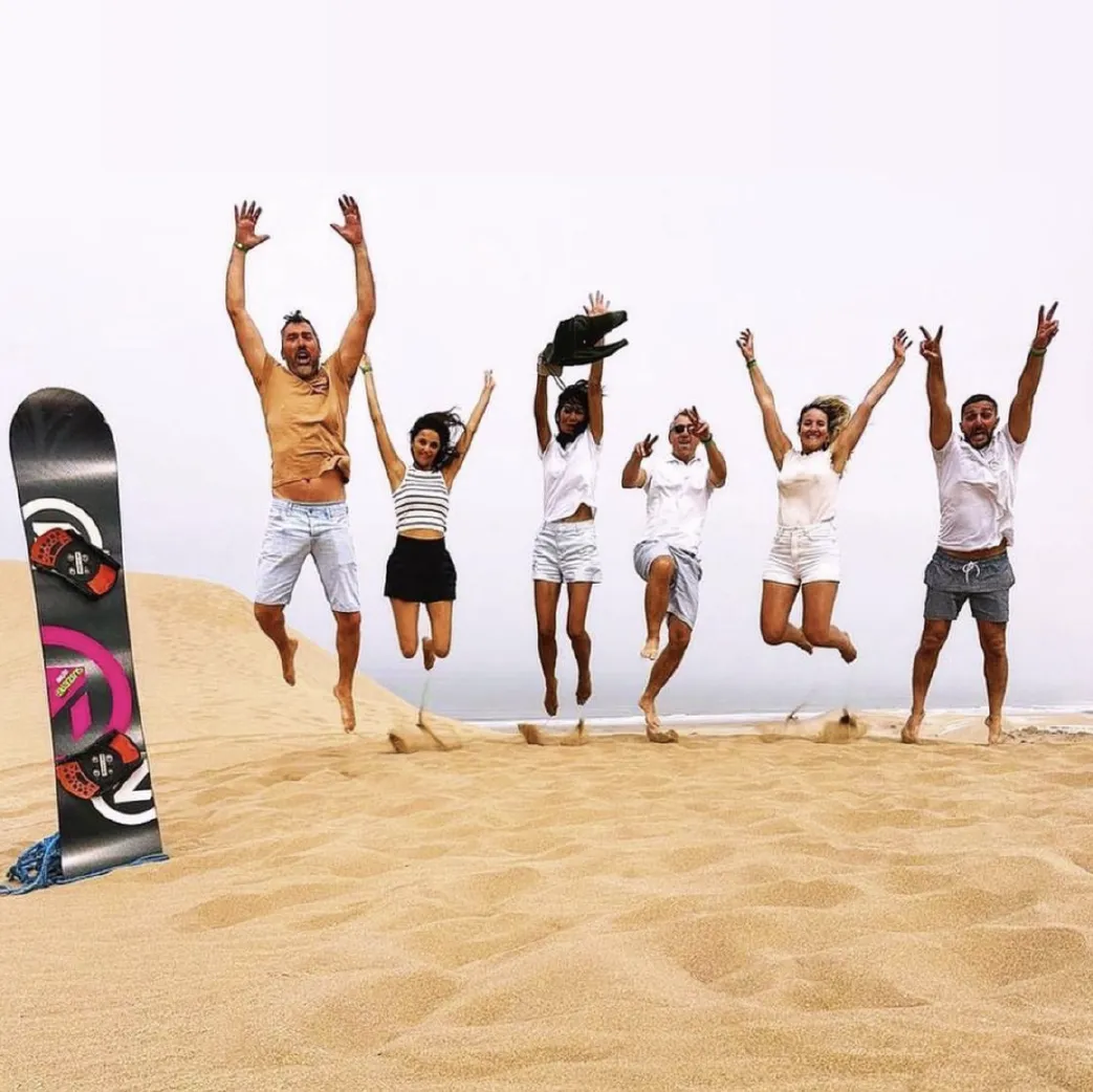 Sandboarding in Timlalin canyon (Timlaline canyons) dunes near Agadir